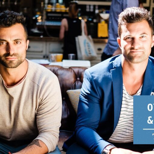 Guy and Ilan Ferdman seated with coffee on a leather sofa, with the Old Souls & Seekers podcast logo